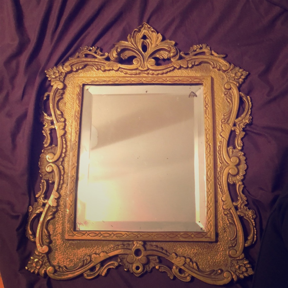 Antique brass mirror dates back to early 1800’s